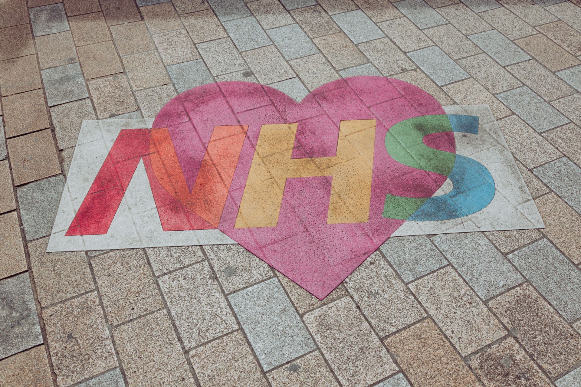 NHS chalked on floor